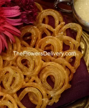 Chashni Jalebi-Sweet gift ideas-Fine quality sweets-Tasty treats and sweets-Sweets for every occasion- Specialty candy store- Sweet tooth cravings- Sweet confectionery delights-Artful dessert presentation- Sweets and chocolates gift sets- Luxurious dessert experiences-Elegant sweet arrangements- Signature sweets collection-Unforgettable candy sensations-Premium quality confections- Flavorful handmade sweets-Rich and delightful sweets-Premium website for sweets- best website for sweets-premium jalebi-best jalebi-buy best jalebi-TFD Pakistan-theflowerdelivery.com